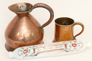 A 19th century copper half gallon harvest jug, raised on circular foot and impressed marks, 20cm