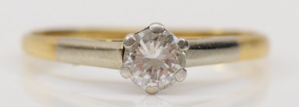 An 18ct gold and platinum set single stone brilliant cut diamond solitaire ring, M, 1.5gm.