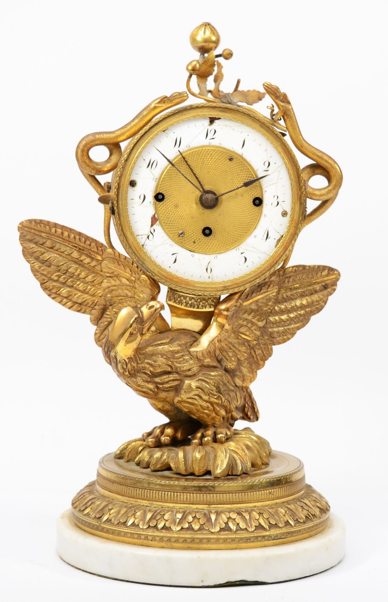A 19th century gilt brass striking and calendar mantle clock, the white enamel chapter ring with