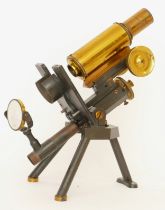 J. Swift & Son; a 20th century brass and black Japanned microscope, with plano-concaved mirror,