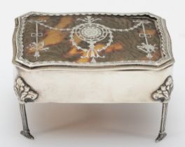 An Edwardian silver and tortoiseshell box, by William Comyns, London 1908, the hinged cover with