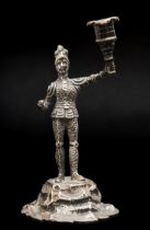 A Victorian cast silver figural candlestick, by C.T Fox & G Fox, London 1865, modelled as an