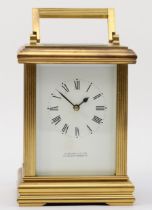 Garrard & Co; a 20th century brass corniche cased hourly striking carriage clock, striking on a