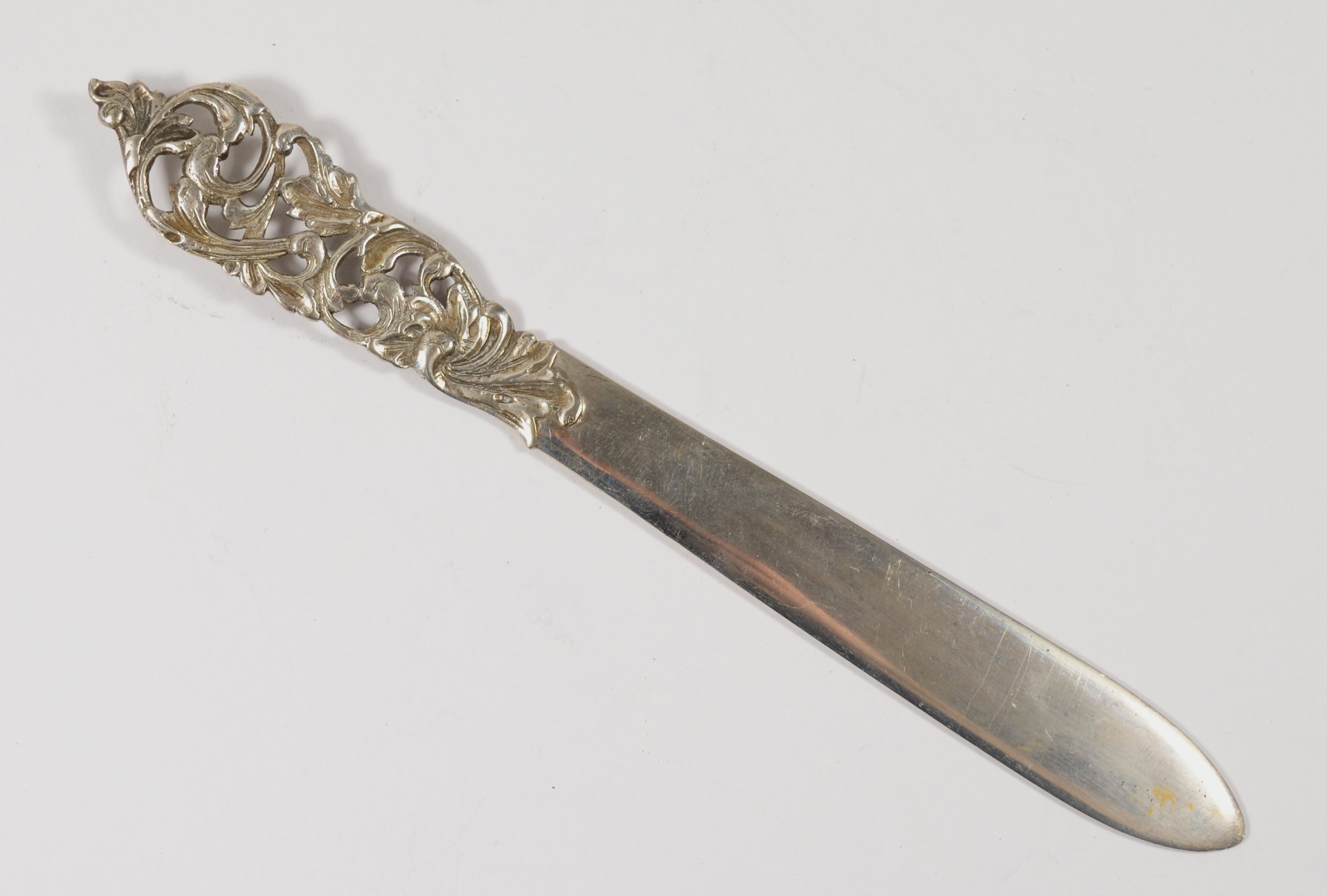 A Scandinavian 830 silver letter opener, with cast floral handle, inscribed Island20cm, 51gm