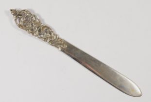 A Scandinavian 830 silver letter opener, with cast floral handle, inscribed Island20cm, 51gm