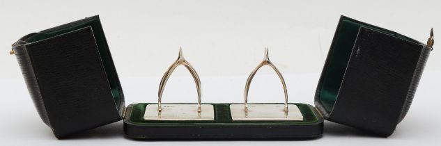 A Victorian silver pair of presentation wishbone menu holders, by Thomas Wimbrush, London 1894,
