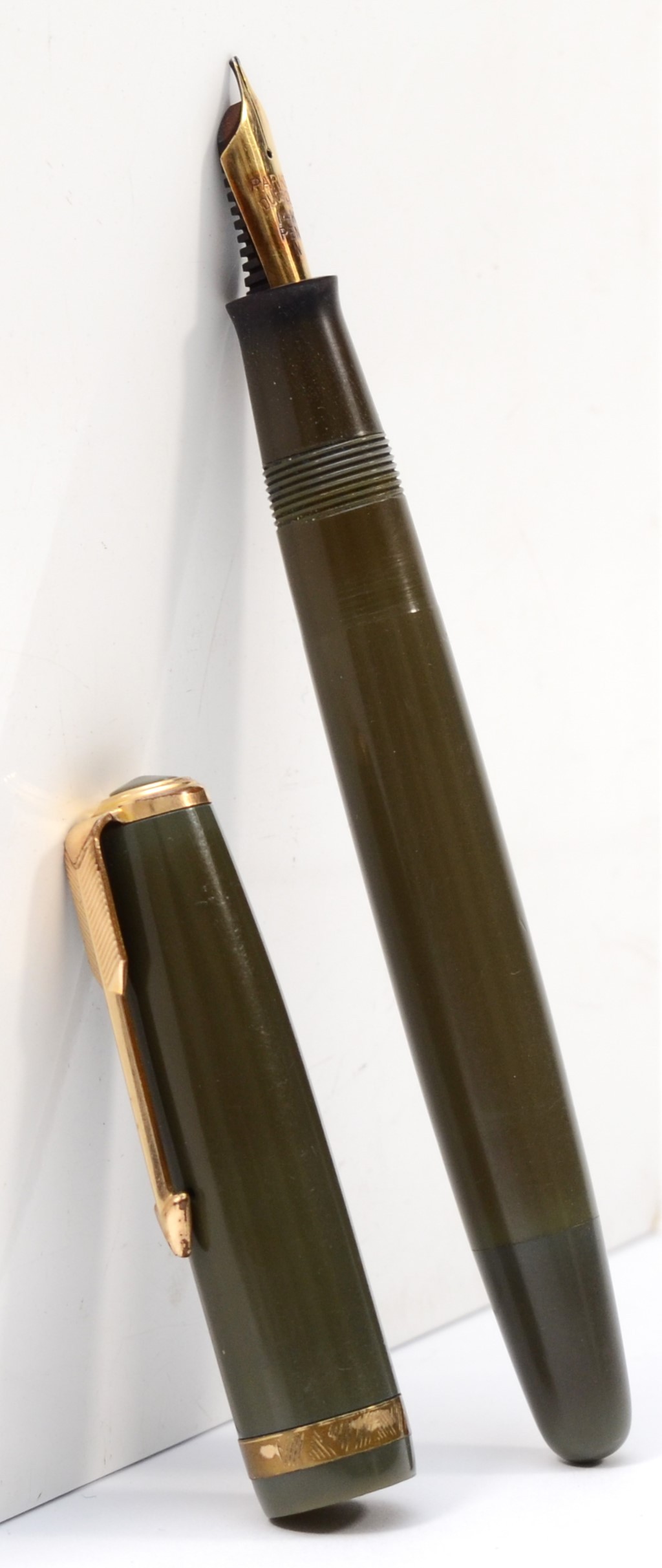 Parker, a Duofold green bodied fountain pen, 14k nib, 13cm.