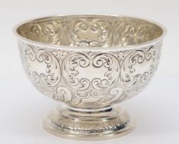 An Edward VII silver rose bowl, by James Deakin & Sons, Sheffield 1906, with embossed foliate scroll