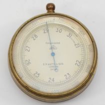 E.R Watts & Son, London, a brass compensated aneroid pocket barometer, numbered 2432, 68mm