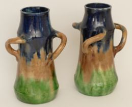 A pair of early 20th century possibly Belgian drip glaze vases in blue, brown and green with three