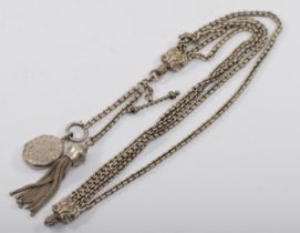 A Victorian unmarked silver albertina pocket watch chain, with attached silver locket, Birmingham