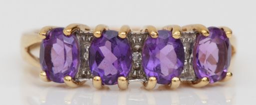 A 9ct gold four stone amethyst and eight cut diamond dress ring, P, 2.1gm.