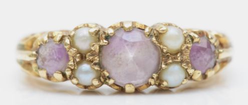 A 9ct gold seed pearl and amethyst dress ring, O, 3.5gm.