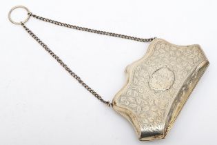 An Edward VII silver purse, by Rolason Brothers, Chester 1907, with chased foliate scroll