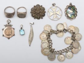 A group of silver jewellery to include a George V silver watch fob, Birmingham 1928, two silver