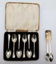 A pair of Georgian silver fiddle pattern sugar tongs, London 1829, monogrammed, together with a