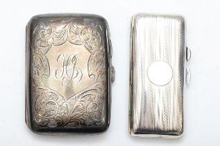 A George V silver cigarette case, Birmingham 1911, together with silver case with chased wave