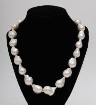 A 585 gold clasped cultured baroque pearl necklace, 45cm, 16 - 22mm pearls, hand knotted