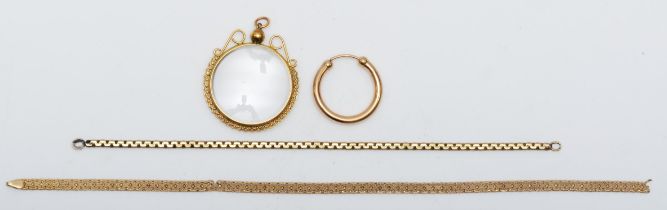 A 9ct gold framed photograph locket, 39mm, a single 9kt gold hoop earring, a 375 gold flat link