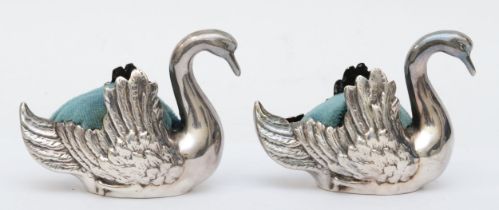 A pair of electroplated silver swan hat pin holders, 7 x 10cm.