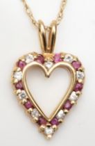 A 9ct gold brilliant cut diamond and ruby heart shaped pendant, on 9k gold chain, 21mm, 2gm.