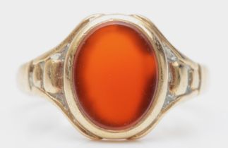 A 9ct gold carnelian signet ring, P, 3.9gm.