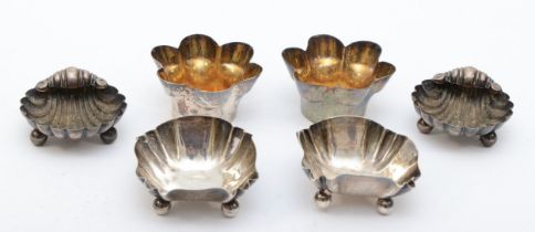 Three pairs of silver cruet sets to include a Victorian silver gilt petaled example, Sheffield 1887,