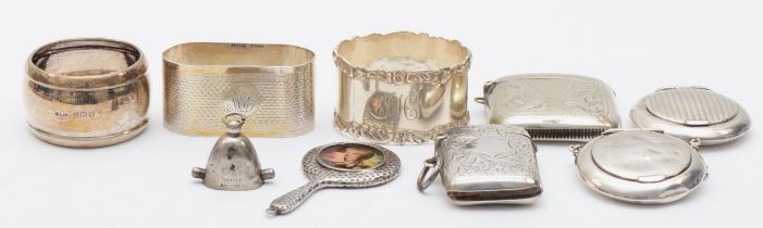 A group of silver items to include three napkin rings, Birmingham 1906, 1930, 1942, a silver vesta