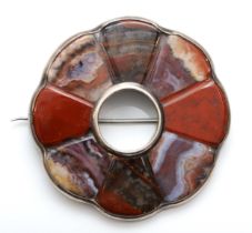 A Victorian silver Scottish agate and carnelian wheel brooch, slate backed, unmarked, 47mm, 18gm.