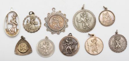 A group of silver St Christopher pendants to include two Georg Jensen examples, 61gm.