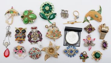 A group of vintage costume brooches to include a Butler & Wilson prototype, stamped to reverse,