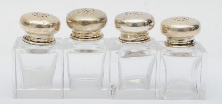 A set of 925 silver topped glass salt shakers, 7.5cm.