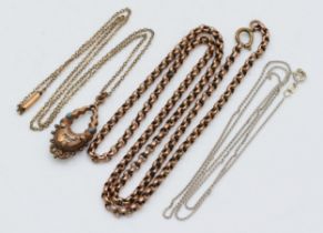 A 14k white gold fine link chain, 1.6gm, together with a Victorian rolled gold pendent and a belcher