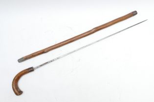 A 19th century sword stick, bent handle, square section blade, blade length 75.5cm