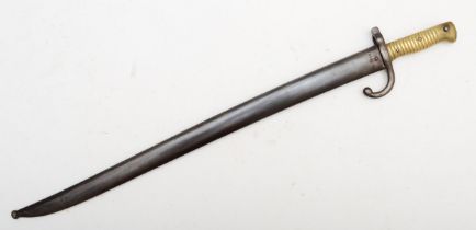 A French 1874 pattern Gras bayonet, the blade engraved with the maker name and address, St.