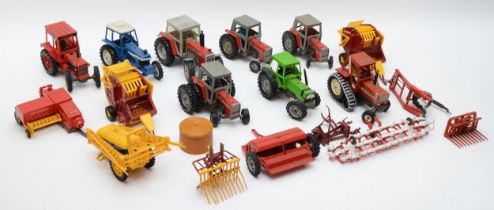 A collection of playworn diecast models by Britains, to include tractors, balers, seed drills,