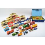 A collection of mid 20th century playworn diecast models, makers to include Matchbox, Corgi and