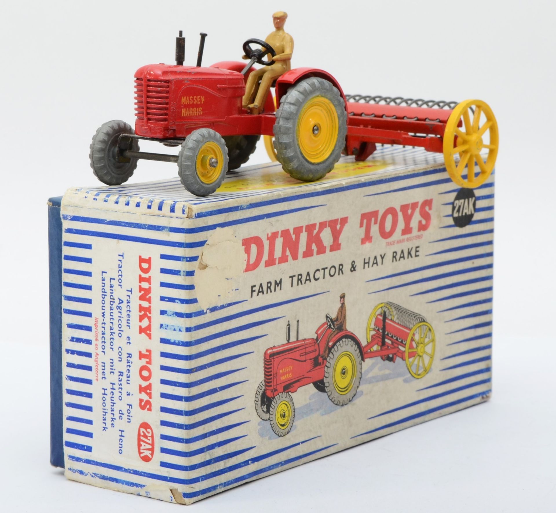 Dinky Toys - A boxed 27AK Farm Tractor & Hay Rake.