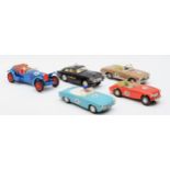 Five 1960s Scalextric racing cars, comprising of a Mercedes 250SL, a Aston Martin D.B.4 and a