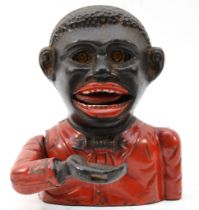 A vintage cast iron Little Joe money box, 13.5cm. These items are listed on the basis they are