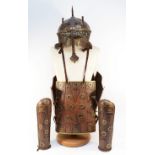 A 19/20th century Persian childs bronze and gilded suit of armour, breast and back plates, forearm