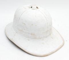 A WWII era pith helmet, by Failsworth Hats Ltd, size 6 3/4, dated 1942