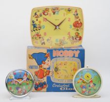 A 20th century Smiths painted tin plate novelty Noddy and Big Ears alarm clock with a boxed Smiths