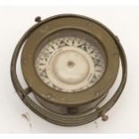 A.T. Chamberlain & Co. a brass 4" ships gimballed compass.
