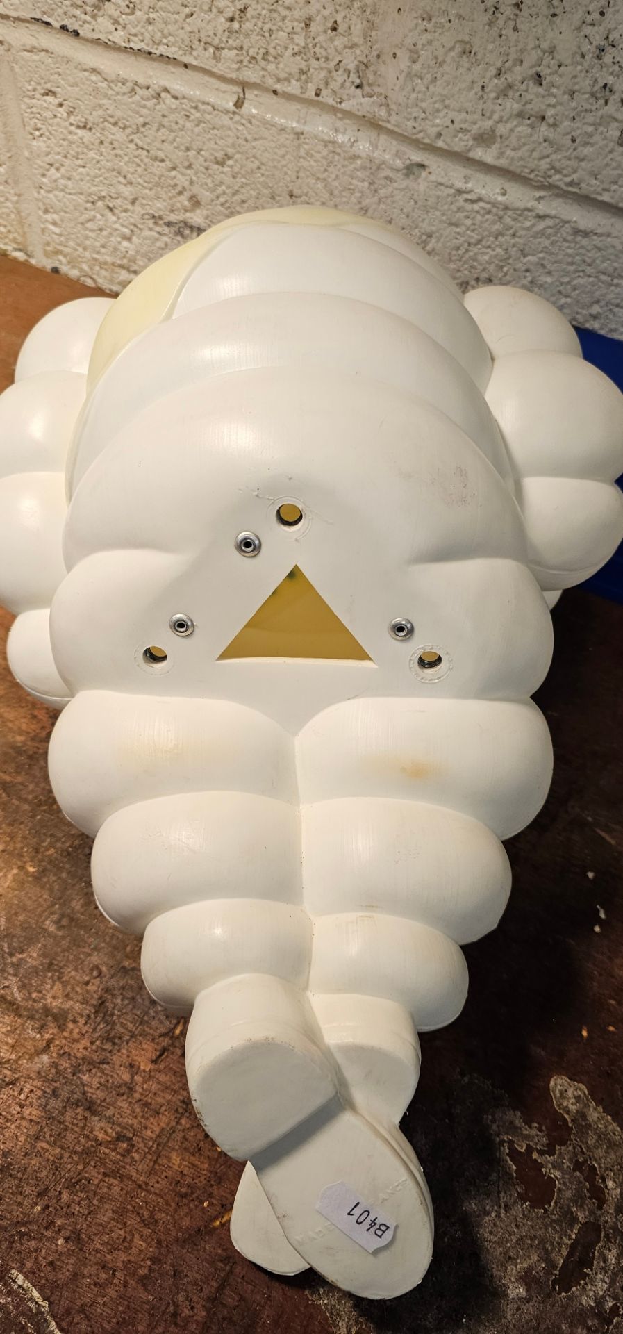 A Bibendum or Michelin Man plastic seated lamp, lacking lighting, 50cm and a standing example, - Image 3 of 4