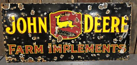 A reproduction John Deere Farm Implements single sided vitreous enamel advertising sign, 45 x 21cm