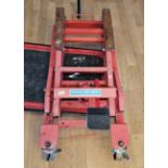 A Kms Distribution 1500 lbs ATV motorcycle hydraulic lift