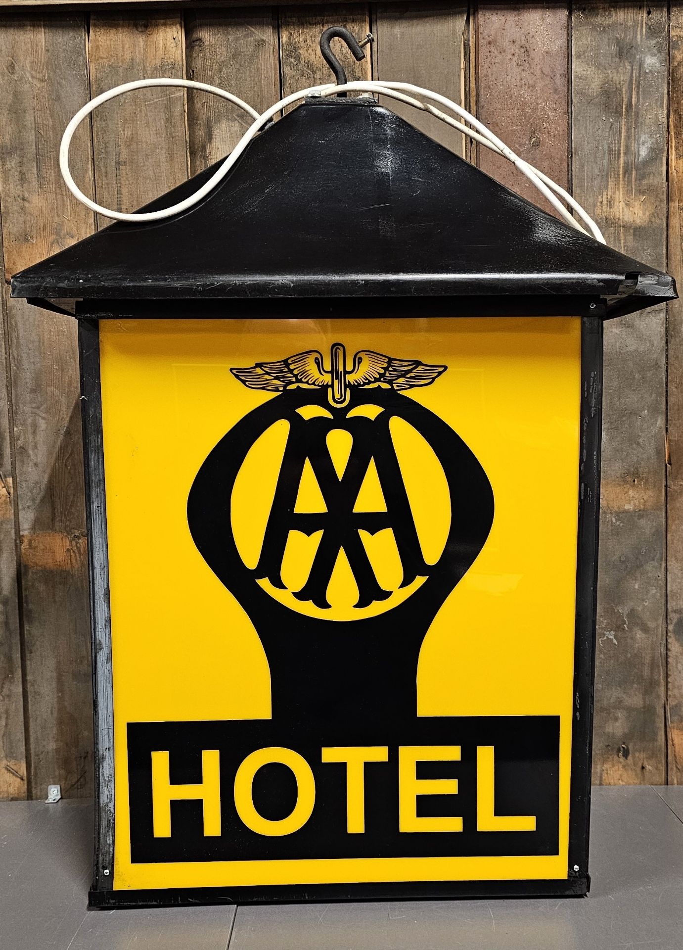 An AA 2 Star Hotel plastic and metal hanging lamp, recently rewired with LED bulb, 90 x 58 x 31cm