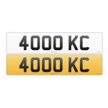 Registration plate "4000 KC" on retention