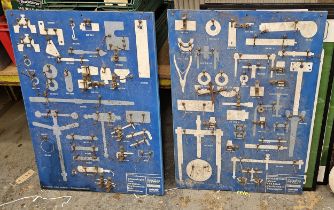 An Austin Rover metal Maestro wall tool display board and a another for an O series engine.